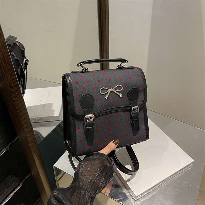 Wholesale Casual and fashionable handbag with heart-shaped printed canvas shoulders