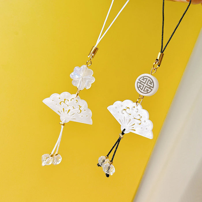 Wholesale Clover white shell fan mobile phone chain pendant bag pendant