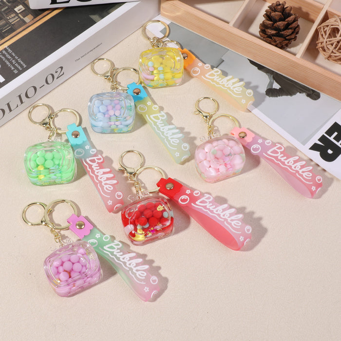 Wholesale Creative personality small square oil quicksand key chain acrylic student backpack mobile phone pendant pendant small gift