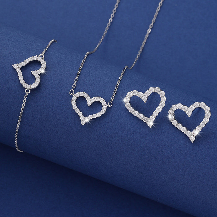 Wholesale Alloy Micro-inlaid Diamond Hollow Heart Bracelet Necklace Earrings Three-piece Set JDC-NE-ZhuoM016