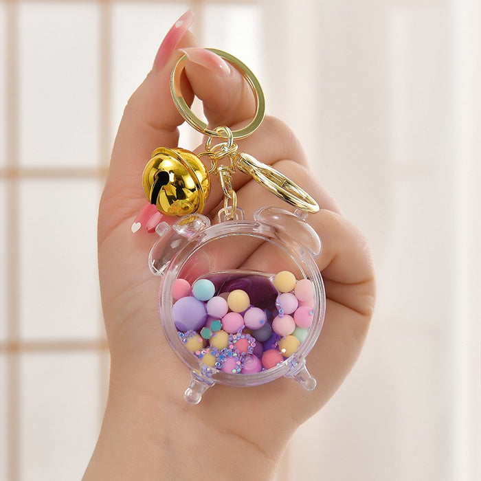 Wholesale Acrylic oil bottle candy Bean astronaut keychain