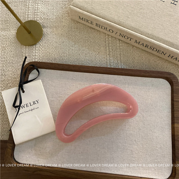 Wholesale Pink semi-circular hair clip with shark clip at the back of the head, versatile hair accessory