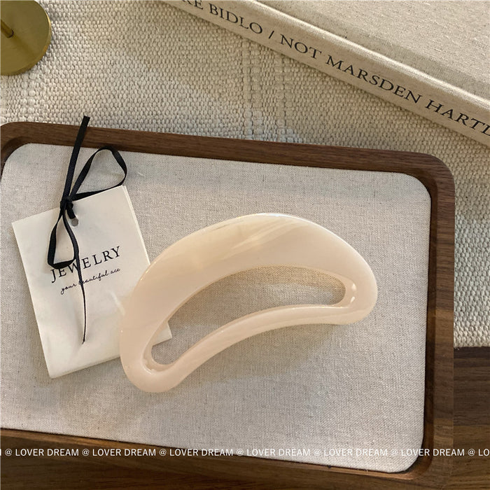 Wholesale Pink semi-circular hair clip with shark clip at the back of the head, versatile hair accessory