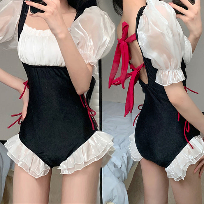 Wholesale Swimsuit with lotus leaf edge connected triangular mesh splicing design, with a niche feel