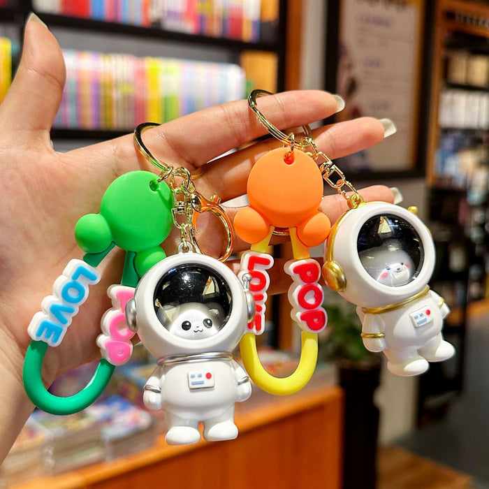 Wholesale Night light astronaut keychain romantic starry sky cute cartoon couple student backpack pendant