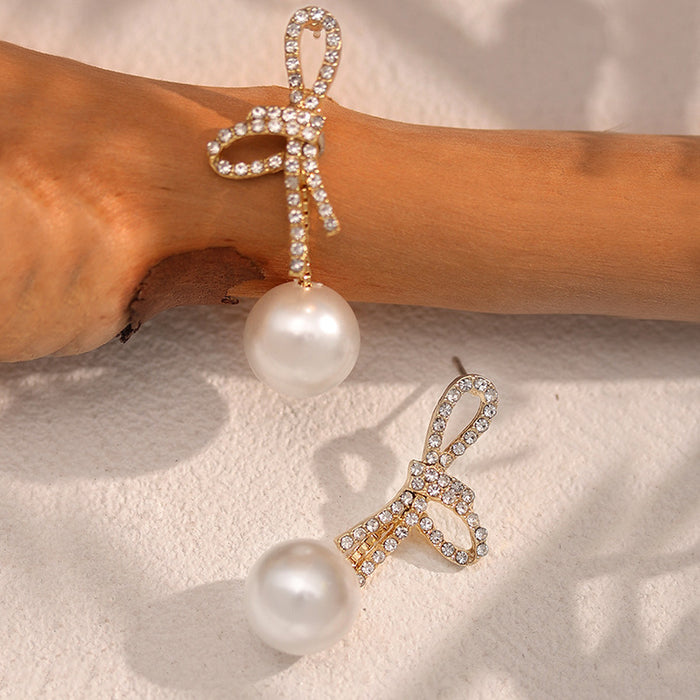 Wholesale Pearl earrings new niche design temperament earrings simple and versatile bow earrings
