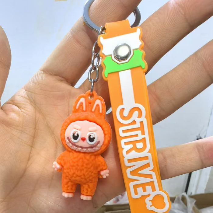 Wholesale Cute cartoon silicone keychain with cute little monster keychain for sweatshirt
