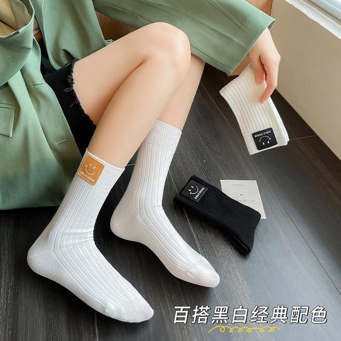 Wholesale Socks, mid tube socks, pure cotton black and white Zhuji socks, smiling face leather label, long tube socks