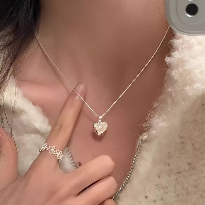 Wholesale Irregular love pearl necklace, light luxury, niche sweater chain, high-end feel