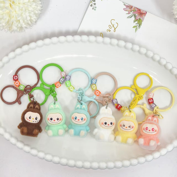 Wholesale flocked cute key doll keychain