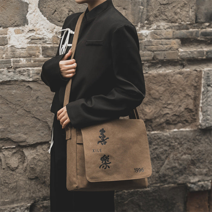 Wholesale Crossbody bag, new high-end backpack, large capacity canvas mailman bag, couple's casual shoulder bag, women's shoulder bag