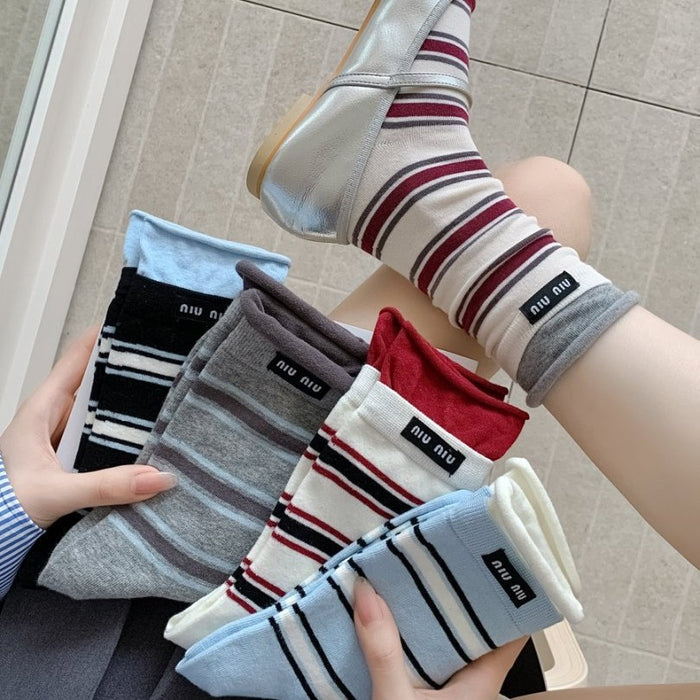 Wholesale Mid length socks with double ribbed stripes and letter labels, trendy cotton socks, minimalist design