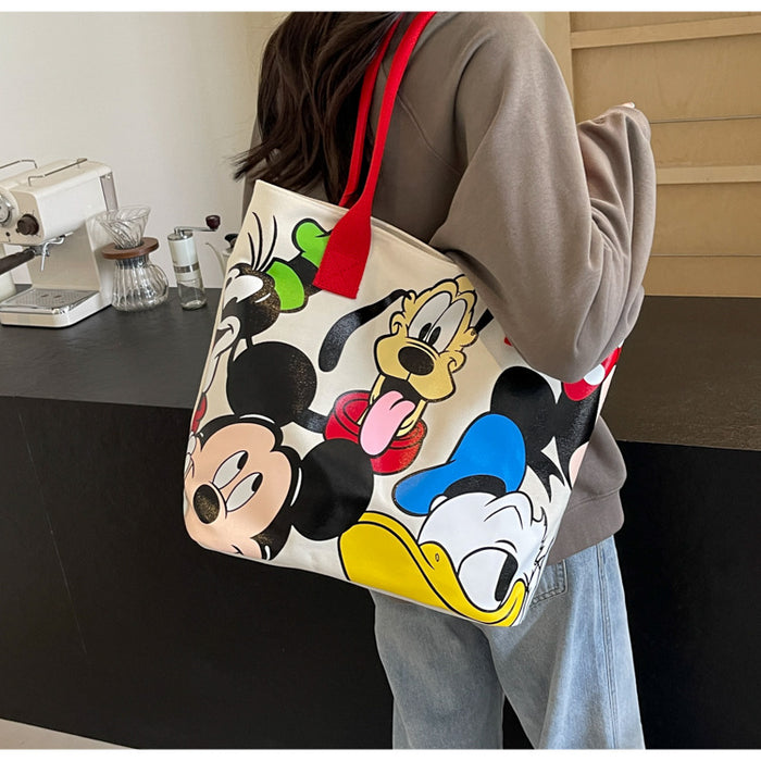 Wholesale Cartoon large capacity canvas shoulder bag, women's casual versatile tote bag, student class backpack, handbag