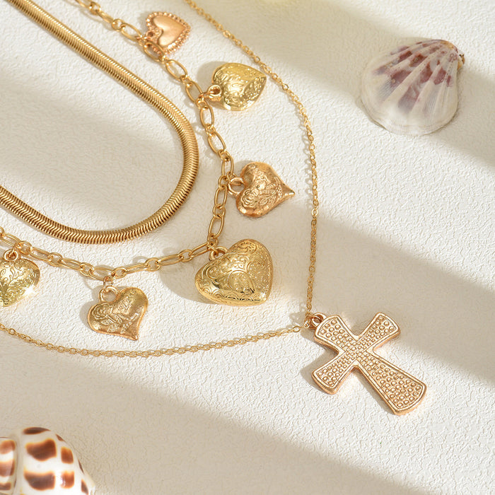 Wholesale Personalized cross pendant necklace, layered with heart-shaped collarbone chain, light luxury niche accessory