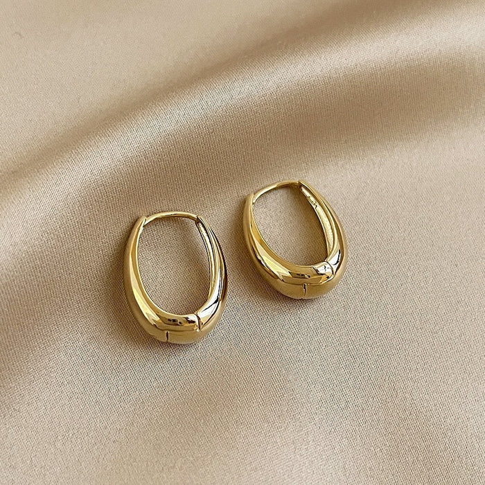 Wholesale Gold colored plain ring earrings, elegant earrings, studs, niche design, high-end ear rings, and earrings