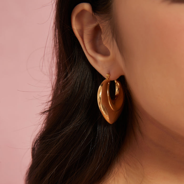 Wholesale Peach heart stainless steel hollow earrings with fashionable temperament, geometric smooth surface earrings, color preservation electroplating