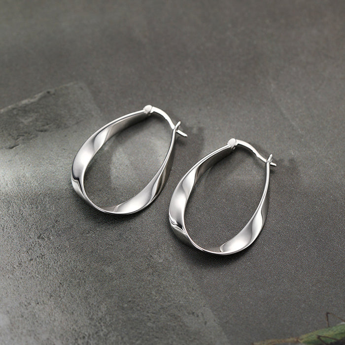 Wholesale Silver needle Mobius earrings, niche earrings, new high-end earrings