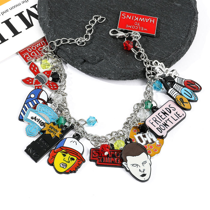Wholesale cartoon cute strange story bracelet zinc alloy drop oil pendant jewelry