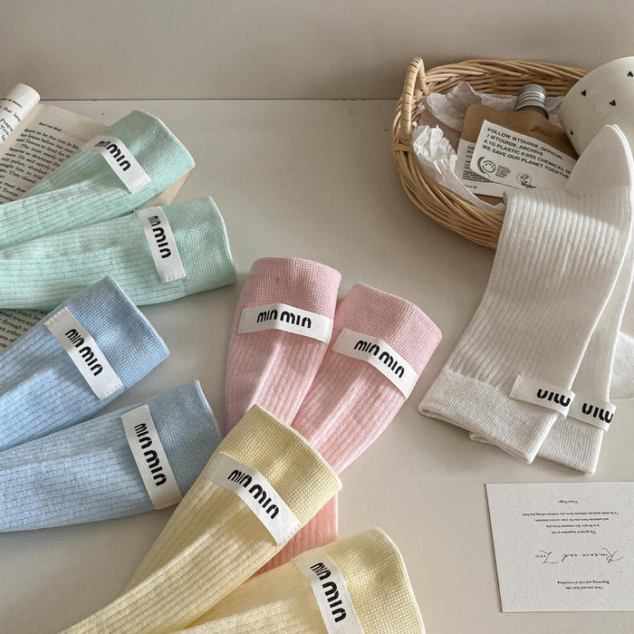 Wholesale Medium length socks with solid color letters, fabric labels, stacked socks, thin cotton socks, sweat absorbing and breathable