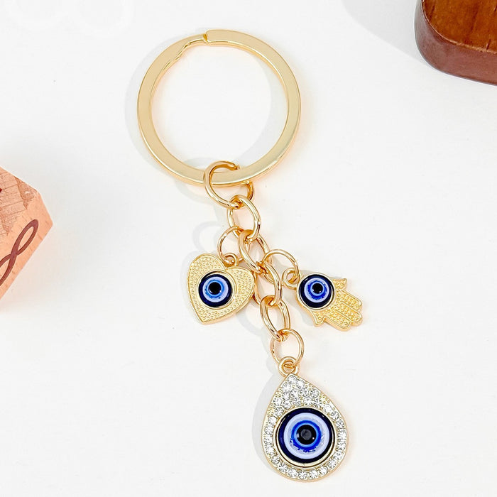 Wholesale Heart-Shaped Palm Water Drop Devil's Eye Pendant Keychain