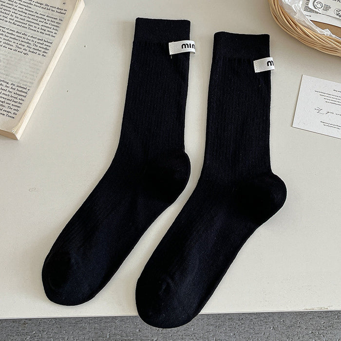 Wholesale Sock fabric label letter pile socks college style versatile colorful mid tube socks