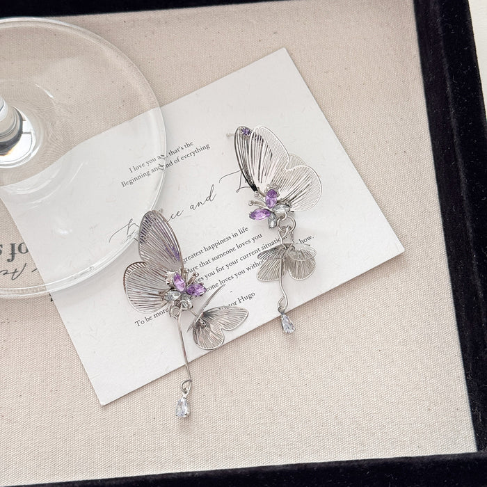 Wholesale Light luxury hollowed out lace butterfly earrings with silver needles, dynamic zircon earrings, earrings, pendants, and earrings