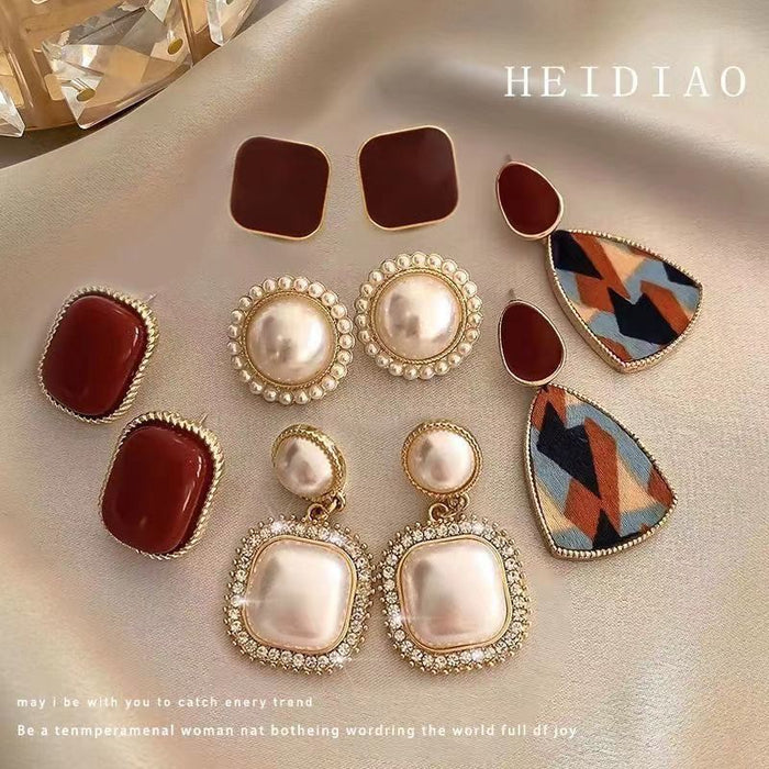 Wholesale Silver needle wine red light luxury retro female temperament pearl earrings high-end earrings
