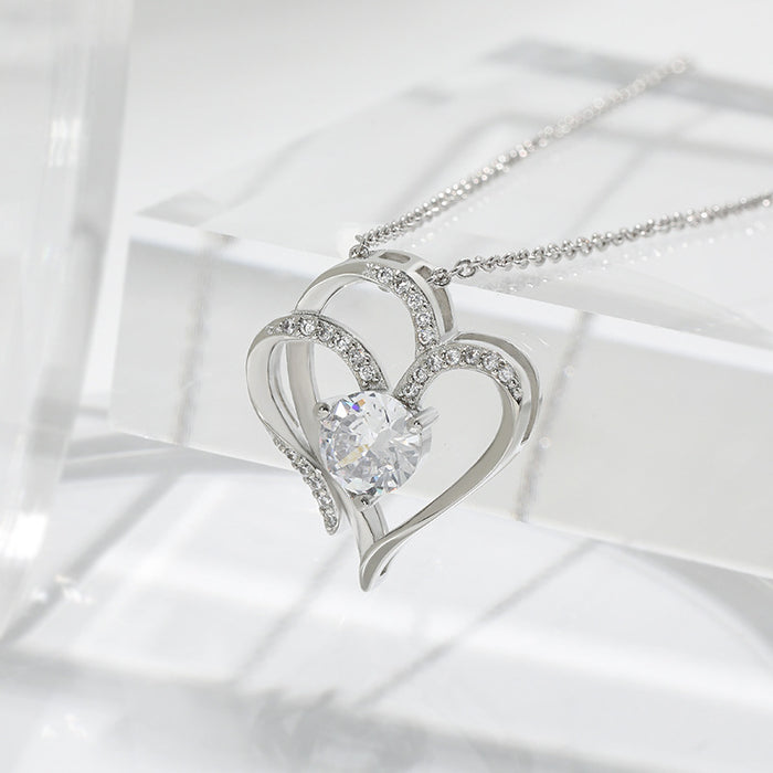 Wholesale Cross border platinum double heart pendant necklace with elegant temperament and high-end feel, set with zircon heart necklace