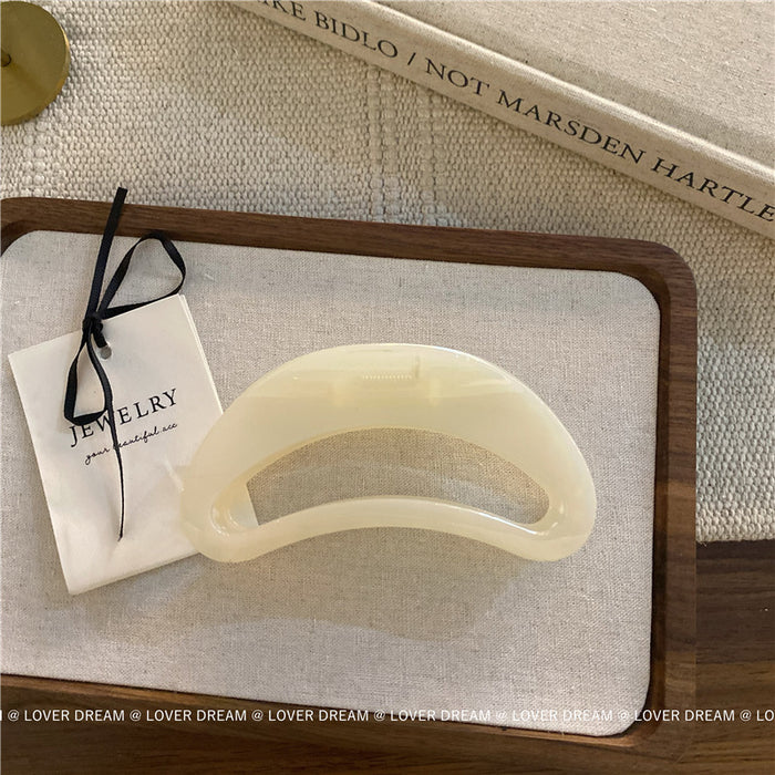 Wholesale Pink semi-circular hair clip with shark clip at the back of the head, versatile hair accessory