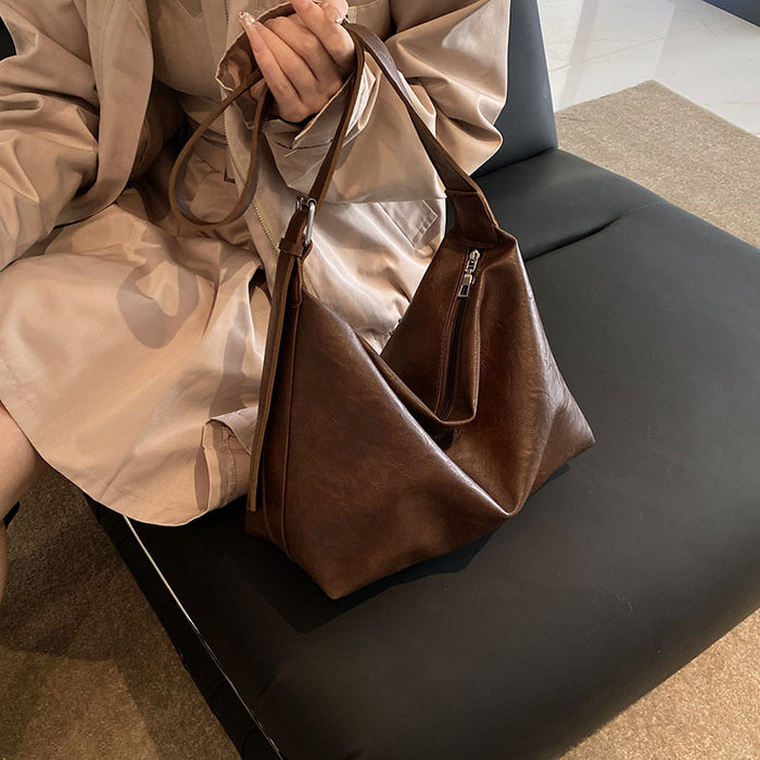 Wholesale Retro commuting single shoulder large capacity crossbody bag, fashionable and versatile tote bag