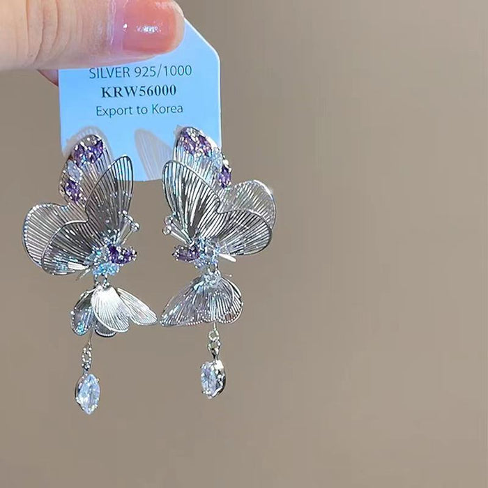 Wholesale Sparkling diamond dynamic hollow butterfly tassel earrings, light luxury temperament, high-end feeling, niche earrings, exaggerated earrings