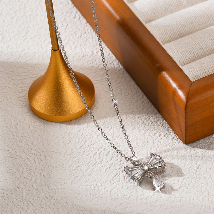 Wholesale Zirconia inlaid bow pendant accessory, titanium steel necklace, niche design, versatile collarbone chain accessory