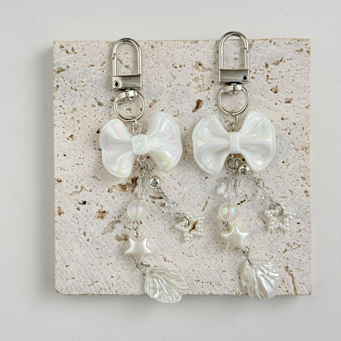 Wholesale Bow shaped mobile phone chain handmade bead bag trailer keychain camera card bag pendant