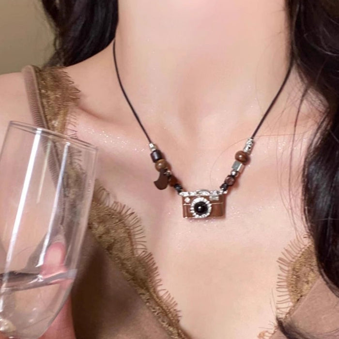 Wholesale Retro brown camera necklace with high-end design, zircon pendant, sweater chain, sweatshirt chain