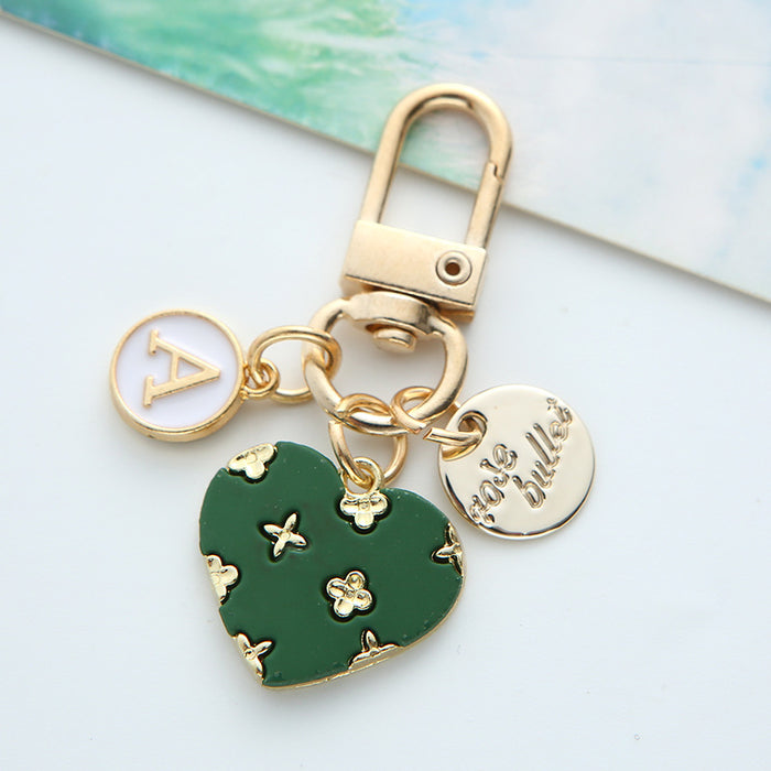 Wholesale alloy love keychain pendant hollow small flower letter round card accessories