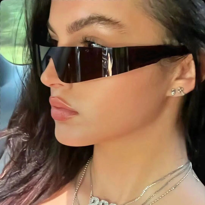 Wholesale Frameless sunglasses, punk sports sunglasses, one-piece fashion sunglasses