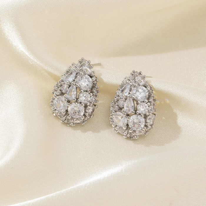 Wholesale High end earrings with full diamond and zircon inlay, silver needles, niche design, hollowed out earrings accessories
