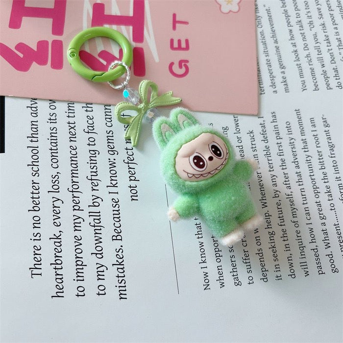 Wholesale 10pcs Cartoon cute bow little monster keychain plush doll pendant student bag hanging ornament gift
