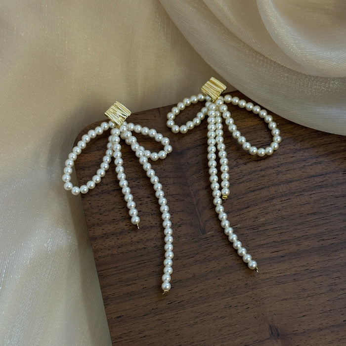 Wholesale Pearl temperament long tassel earrings, niche design, high-end long tassel ear clip