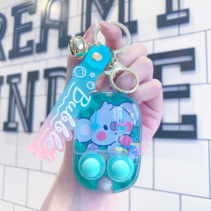 Wholesale water ring game machine key chain hanging decoration decompression toy gift keychain small pendant doll