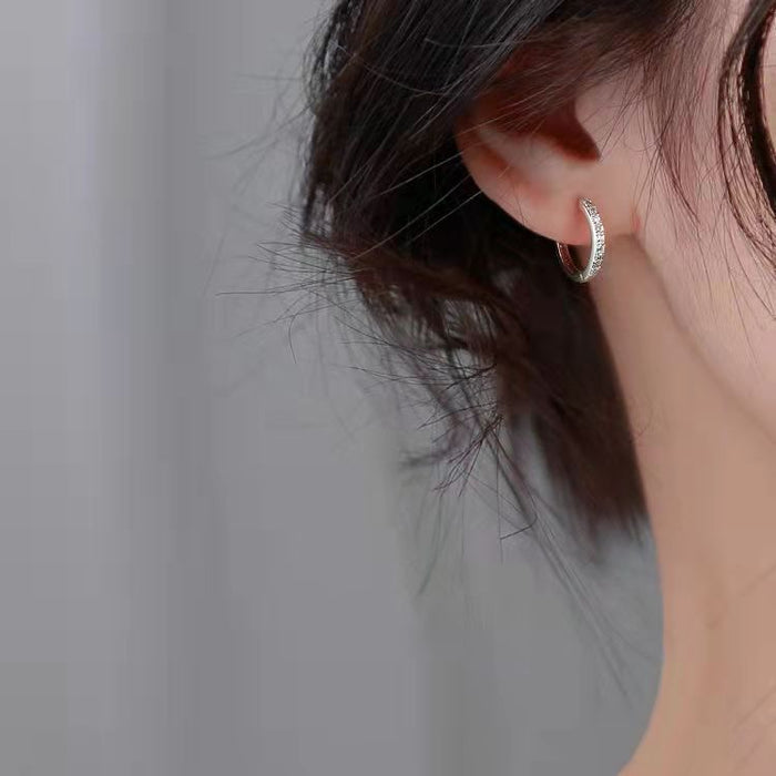 Wholesale Versatile silver plated sparkling diamond earrings with simple circular ear loops, exuding a sweet and feminine charm