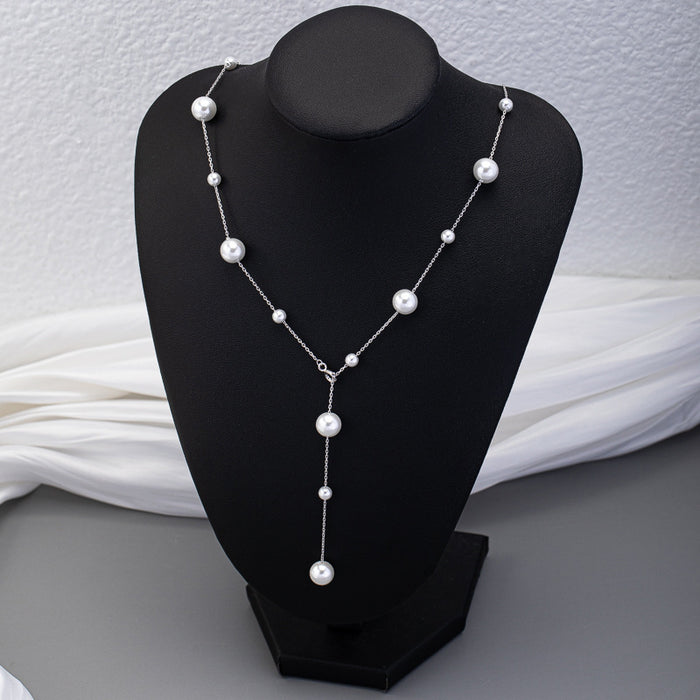 Wholesale Sweater chain pearl long versatile collarbone chain light luxury niche tassel necklace