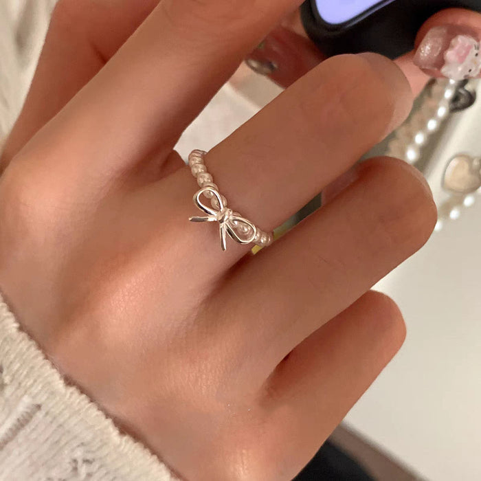 Wholesale Bow pearl ring for women, light luxury, exquisite and high-end index finger ring, adjustable index finger ring