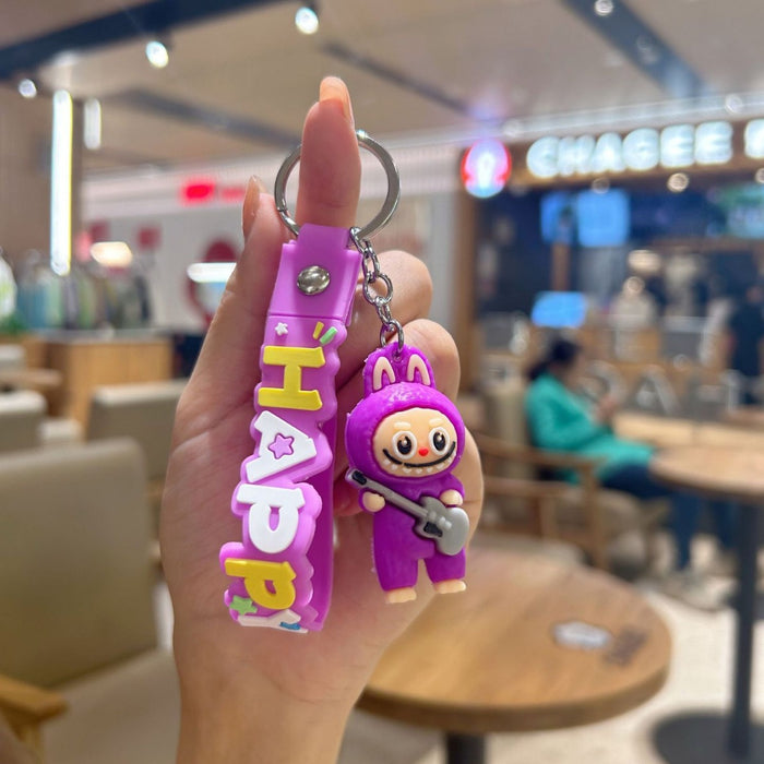 Wholesale Cute cartoon silicone keychain with cute little monster keychain for sweatshirt