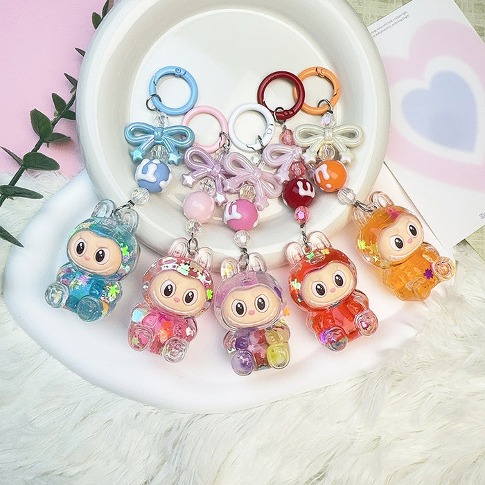 Wholesale Acrylic Cloth Quicksand Keychain Luminous Flash Cute Doll Bag Pendant Gift Keychain