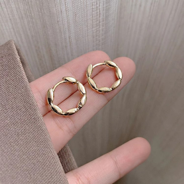Wholesale Simple and versatile high-end sensory ring ear buckle earrings with elegant design, light luxury titanium steel earrings with ear rings
