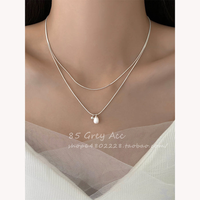 Wholesale Double layered pearl necklace for women, niche, light luxury, fashionable, collarbone chain, temperament, simple necklace