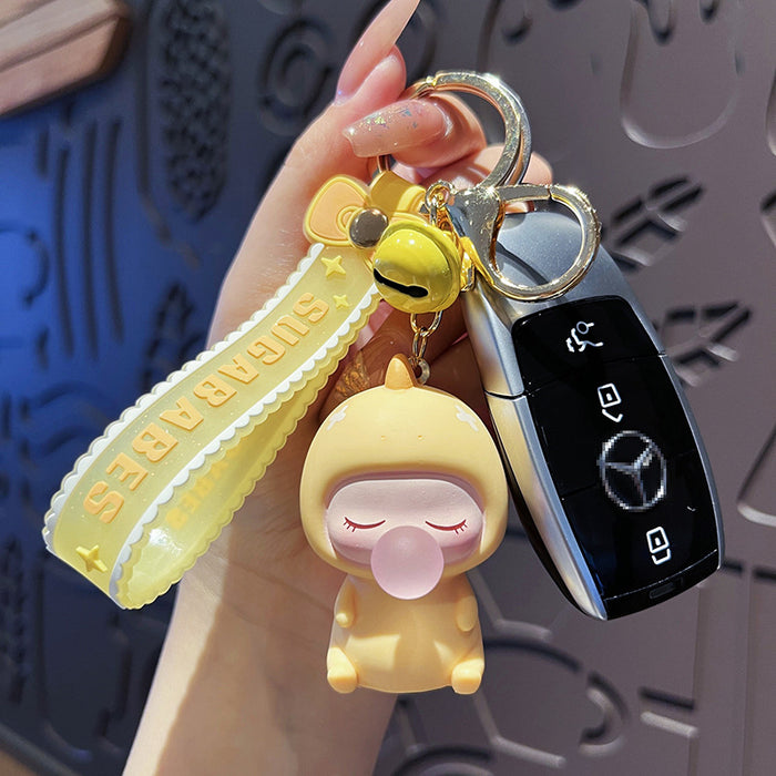 Wholesale Dudu Little Dinosaur Cartoon Keychain Couple Bag Pendant Creative Bubble Doll Small Gift