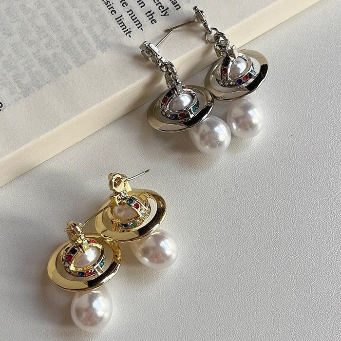 Wholesale UFO-engraved Saturn gold and silver teardrop pearl earrings