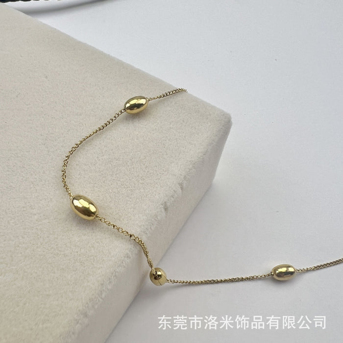 Wholesale Unique and niche gold bean bracelet with fashionable and minimalist design